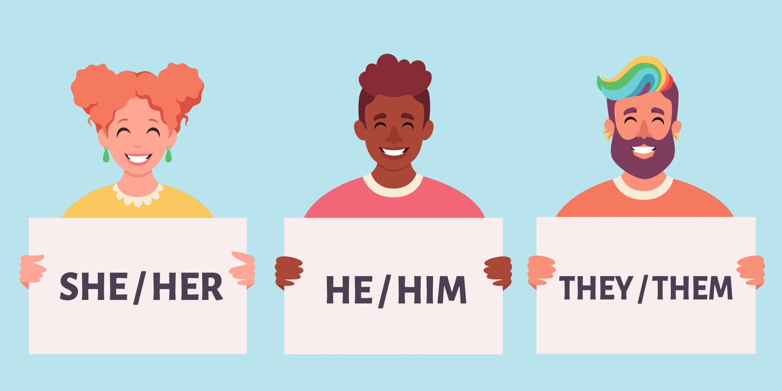 People holding up signs stating their pronouns