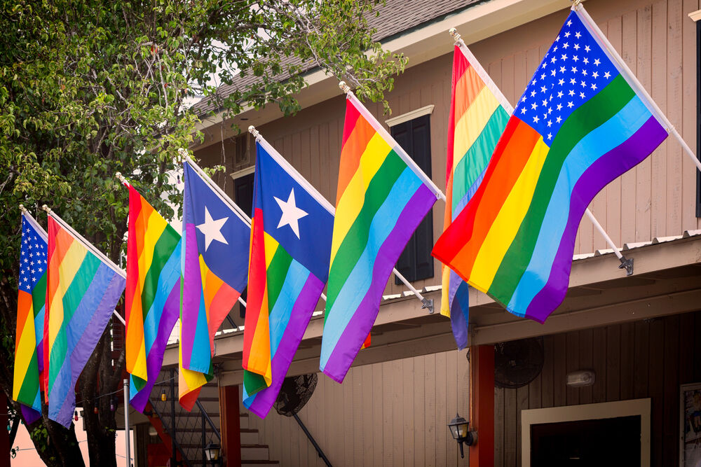 Rainbow and Texas flags
