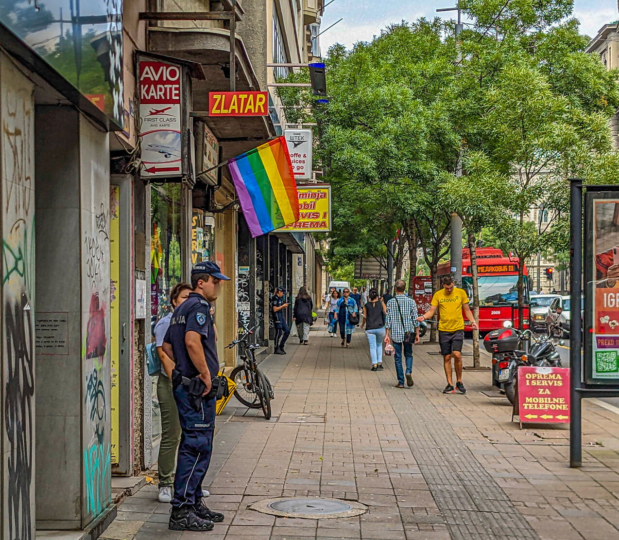 An officer stands guard outside the Belgrade Pride Info Center