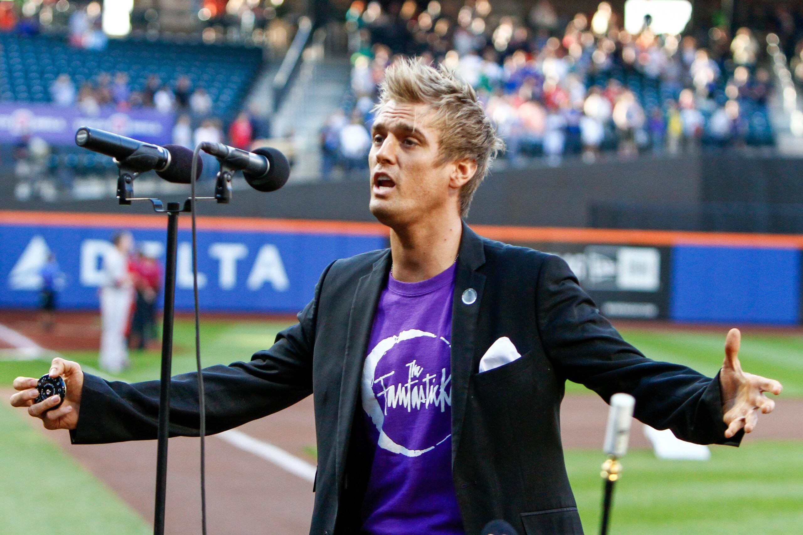 FLUSHING, NY - JUN 15: Singer Aaron Carter performs the National Anthem before the game between the New York Mets and Cincinnati Reds at CitiField on June 15, 2012 in Flushing, New York.