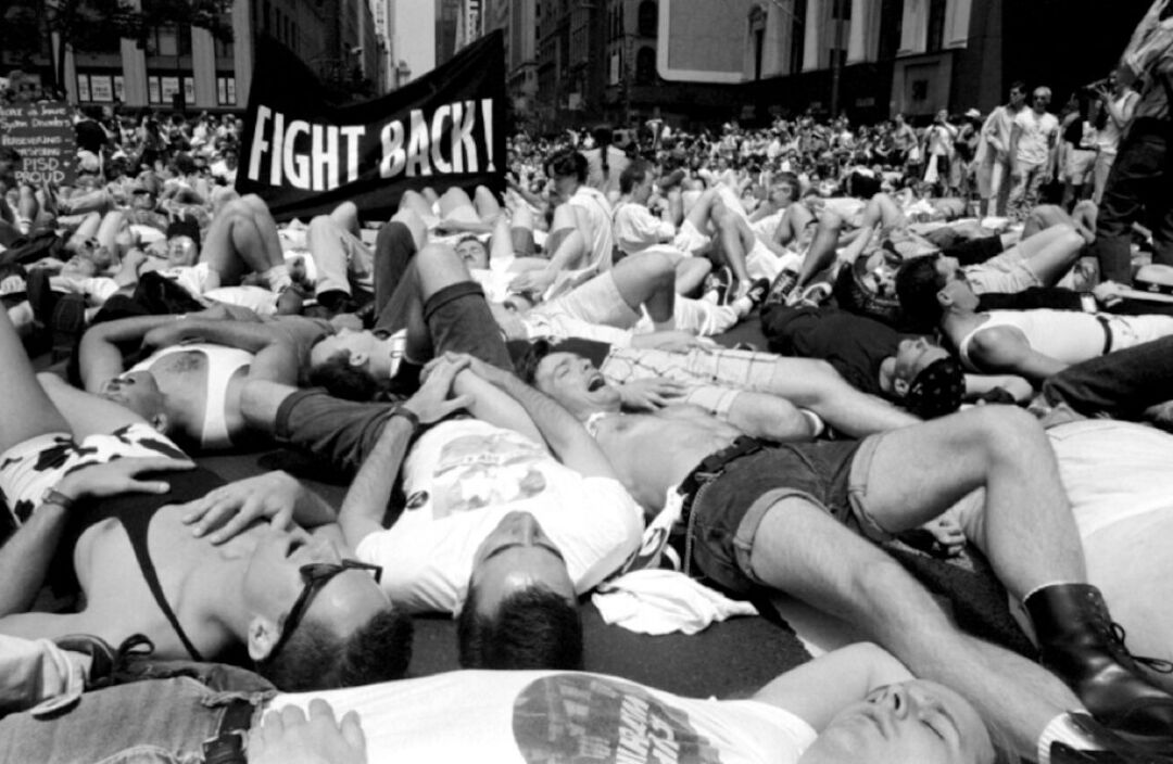 How many more have to die? ACT UP protest, circa 1990. Photo by T.L. LItt km-soehnlein-and-ron-goldberg-army-of-lovers-hiv-aids-epidemic-lgbtq-activist