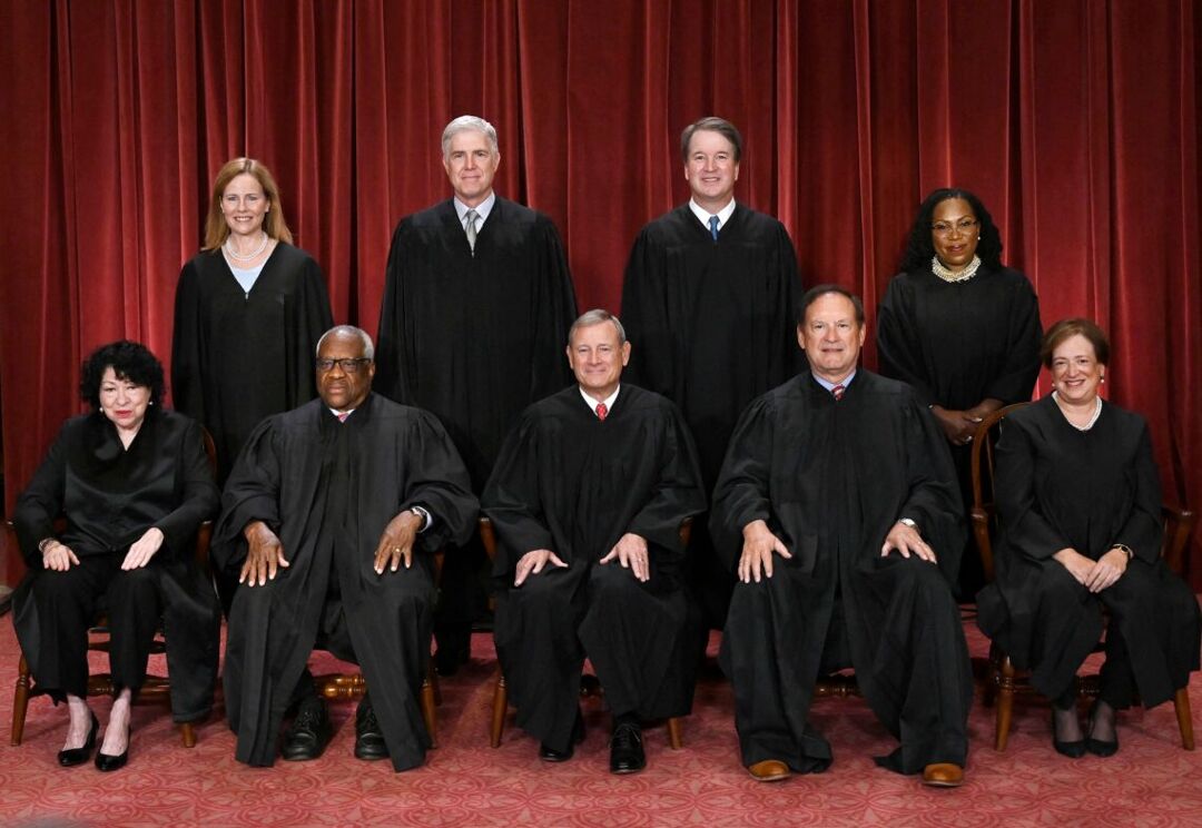 Justices of the US Supreme Court pose for their official photo at the Supreme Court in Washington, DC on October 7, 2022. (Seated from left) Associate Justice Sonia Sotomayor, Associate Justice Clarence Thomas, Chief Justice John Roberts, Associate Justice Samuel Alito and Associate Justice Elena Kagan, (Standing behind from left) Associate Justice Amy Coney Barrett, Associate Justice Neil Gorsuch, Associate Justice Brett Kavanaugh and Associate Justice Ketanji Brown Jackson.