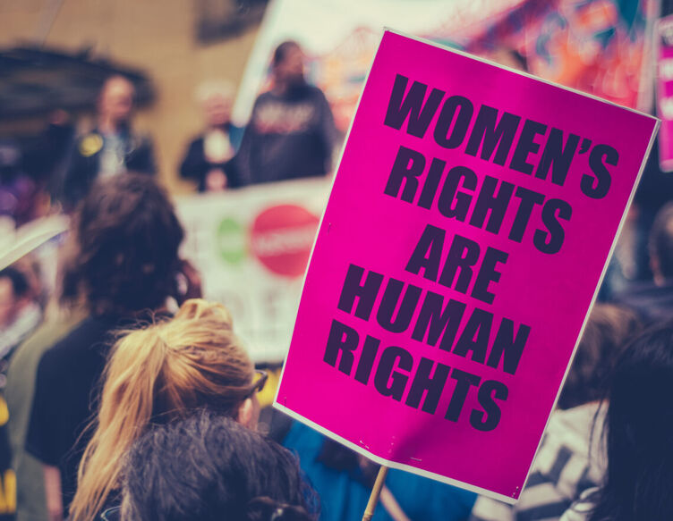 Pink sign that reads Women's Rights Are Human Rights.