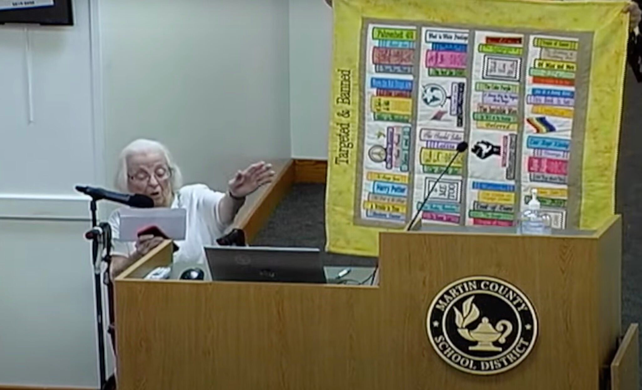 100-year-old Grace Linn speaks before Florida school board and shows off her quilt of banned books