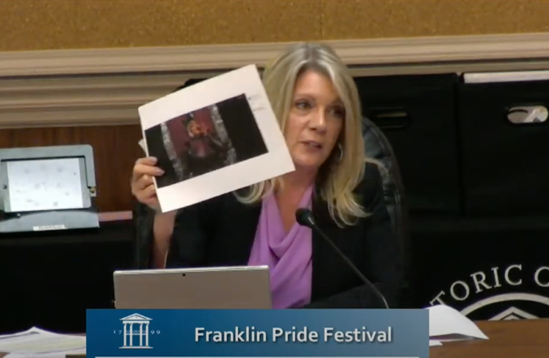 Town official tries to stop Pride by holding up pic of drag queen eating “live, bleeding heart”