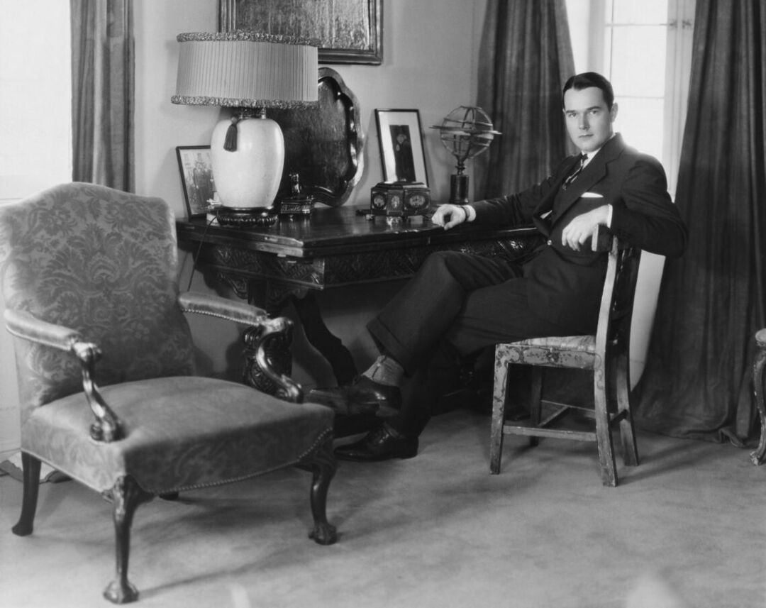 American actor and interior designer William Haines (1900 - 1973) in the study at his home circa 1928. Photo by Ruth Harriet Louise/Margaret Chute/Hulton Archive/Getty Images