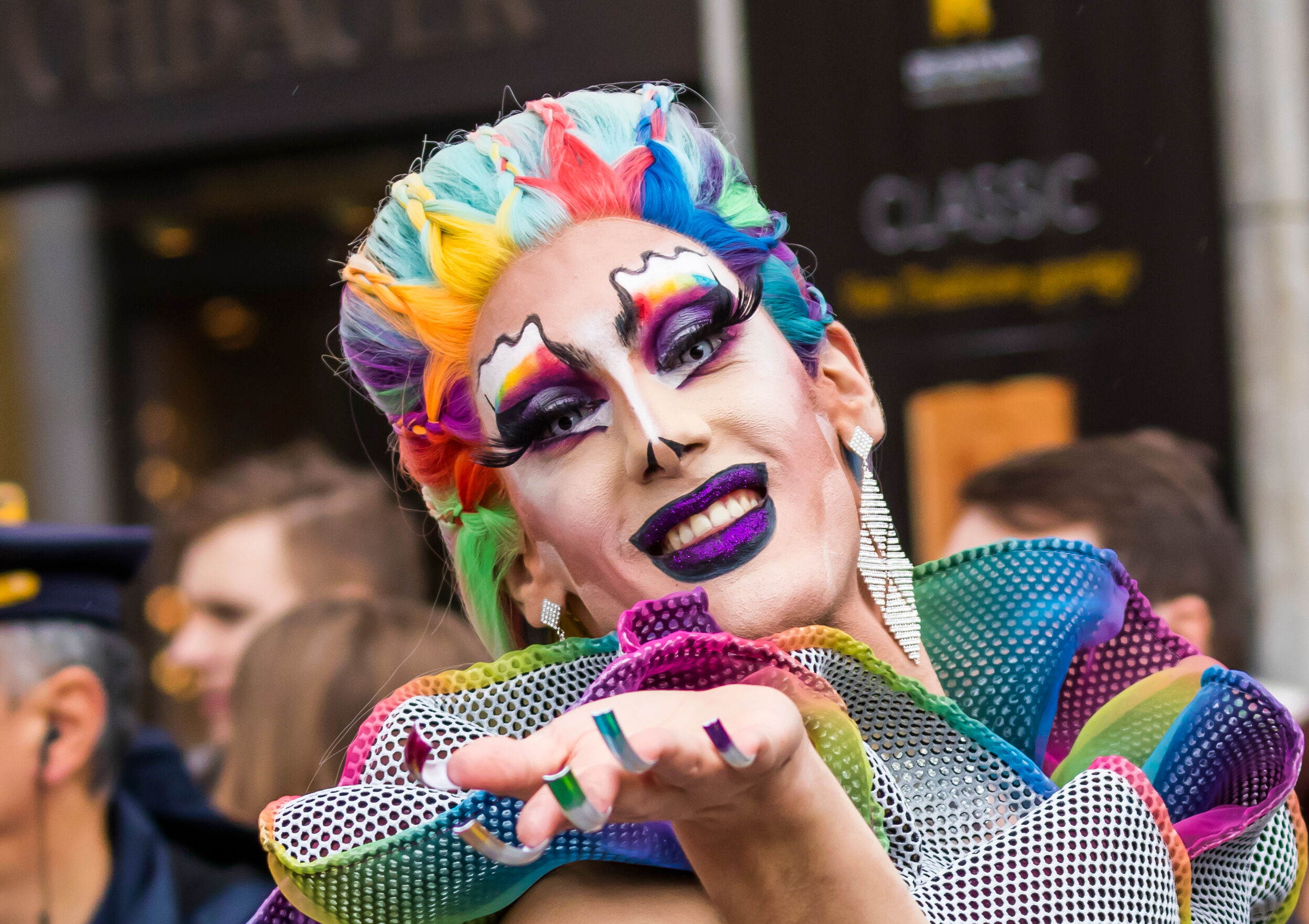 MUNICH, BAVARIA / GERMANY - JULY 13, 2019: A drag queen blowing kisses into the camera attending the Gay Pride parade also known as Christopher Street Day (CSD) in Munich, Germany.