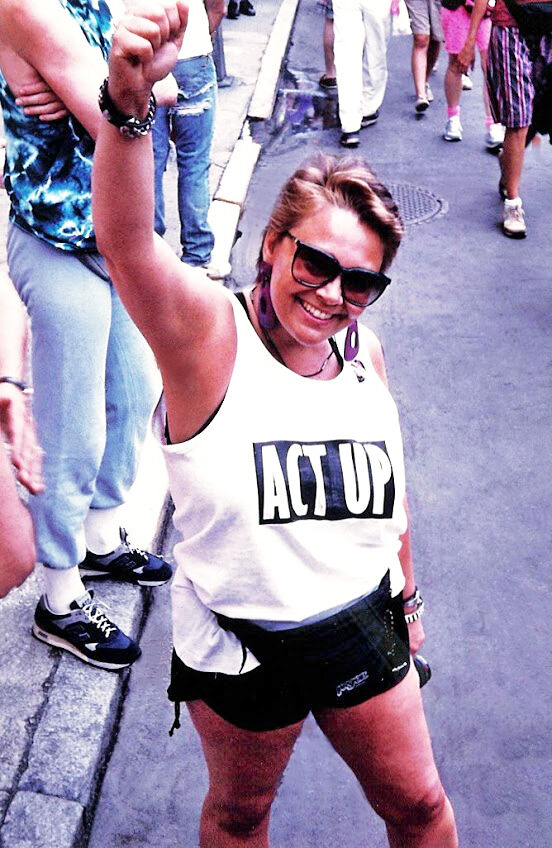 Chris Almvig poses in an ACT Up t-shirt at the 1992 Pride Parade in New York City.