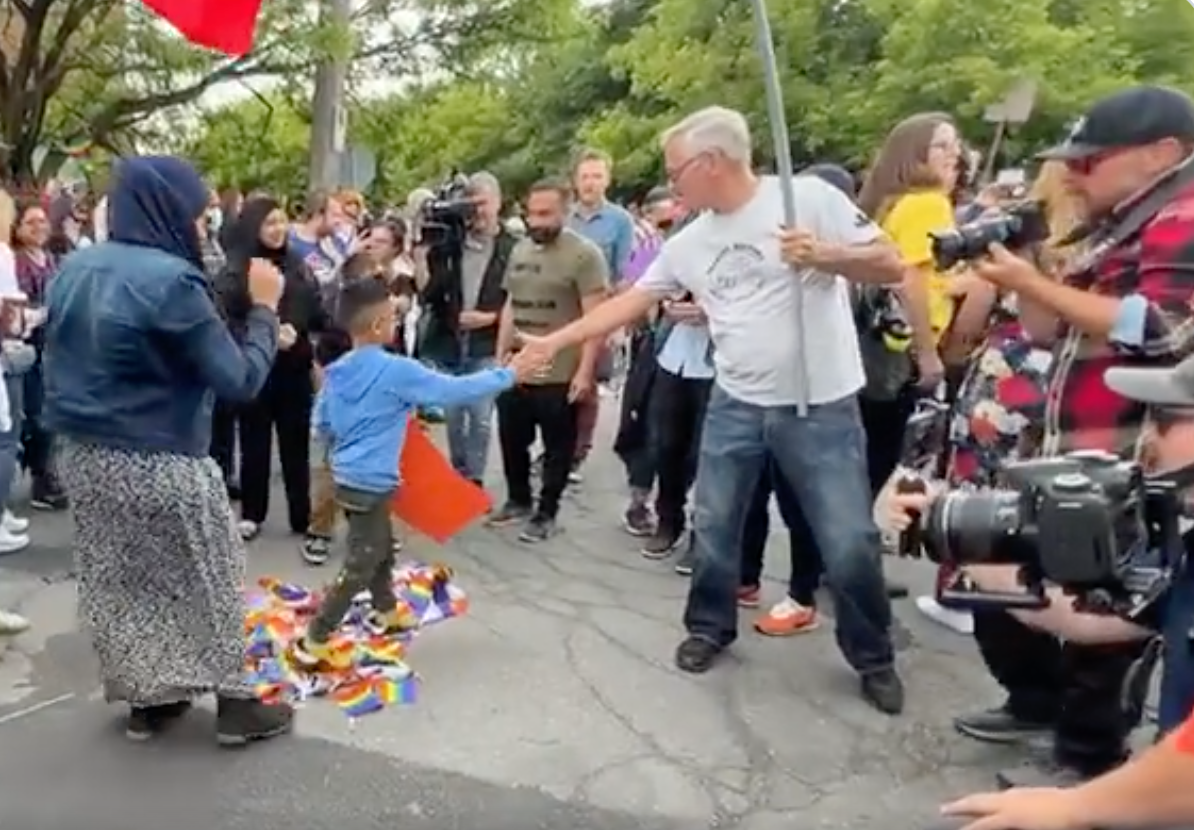 Moms force kids to stomp on rainbow flags in horrifying protest against their LGBTQ+ classmates