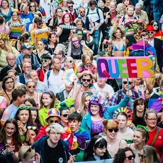a large group of people celebrating Edinburgh Pride