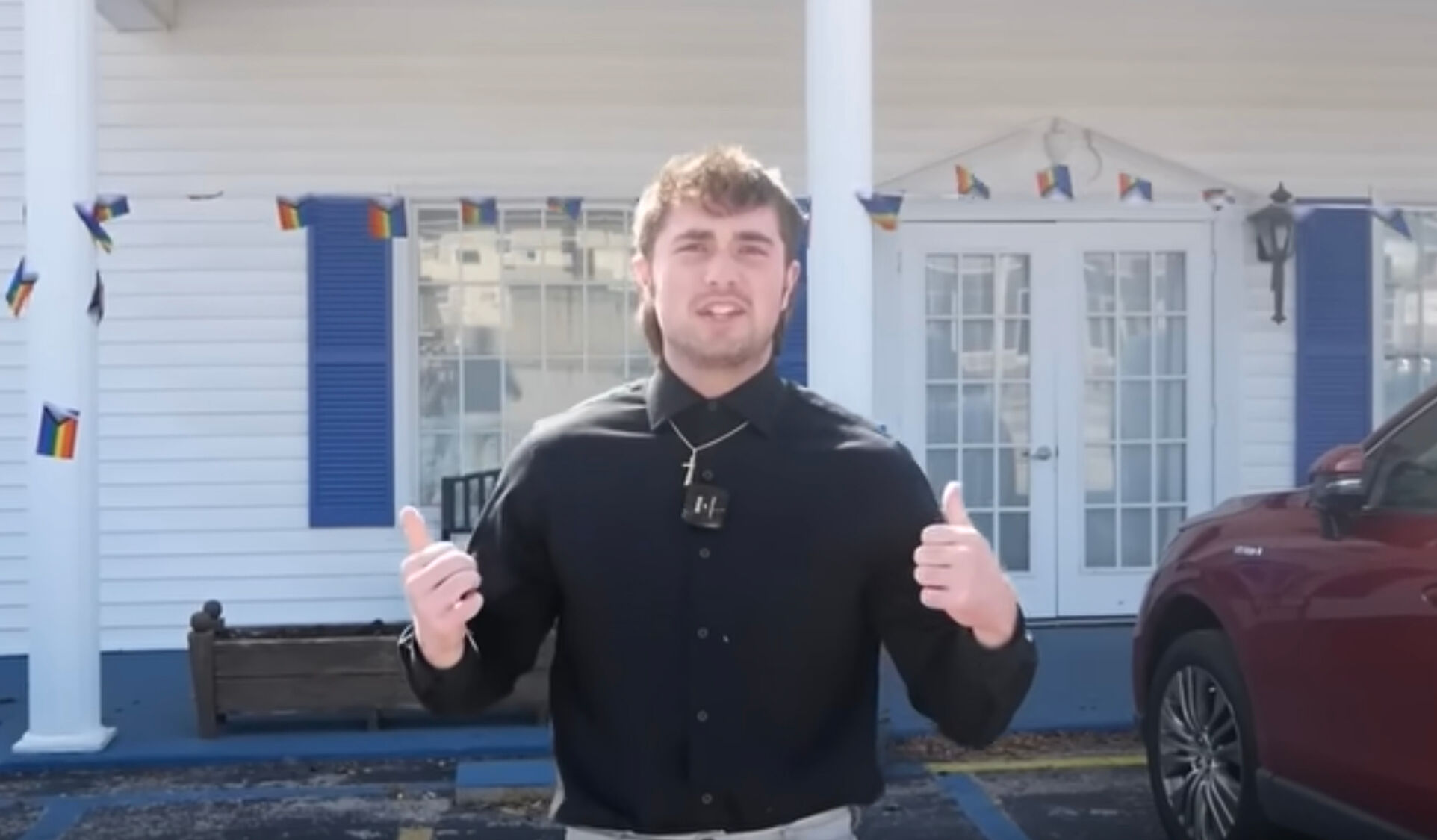 YouTuber Bo Alford outside another LGBTQ+-inclusive church.