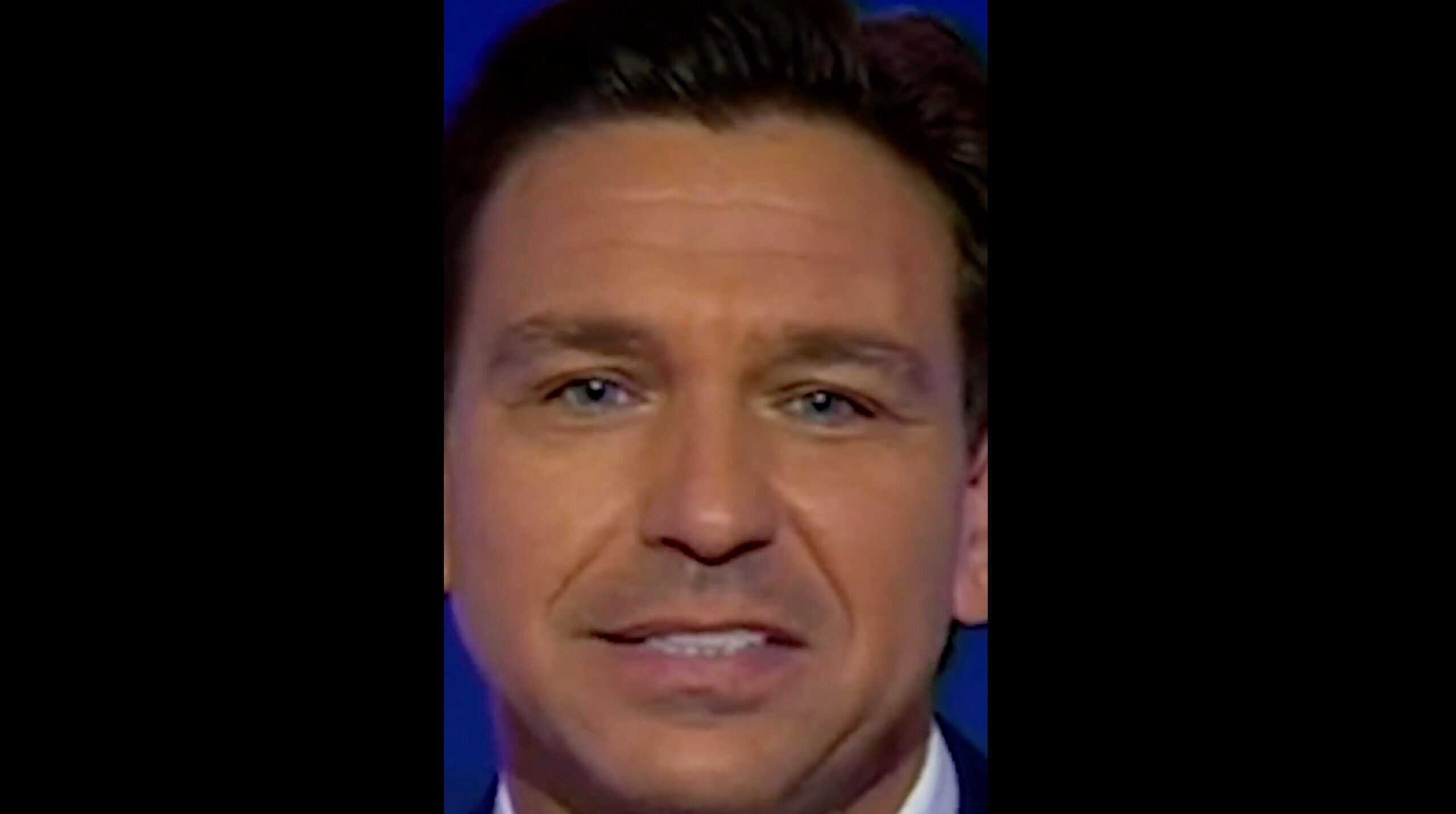 Ron DeSantis smile attempt