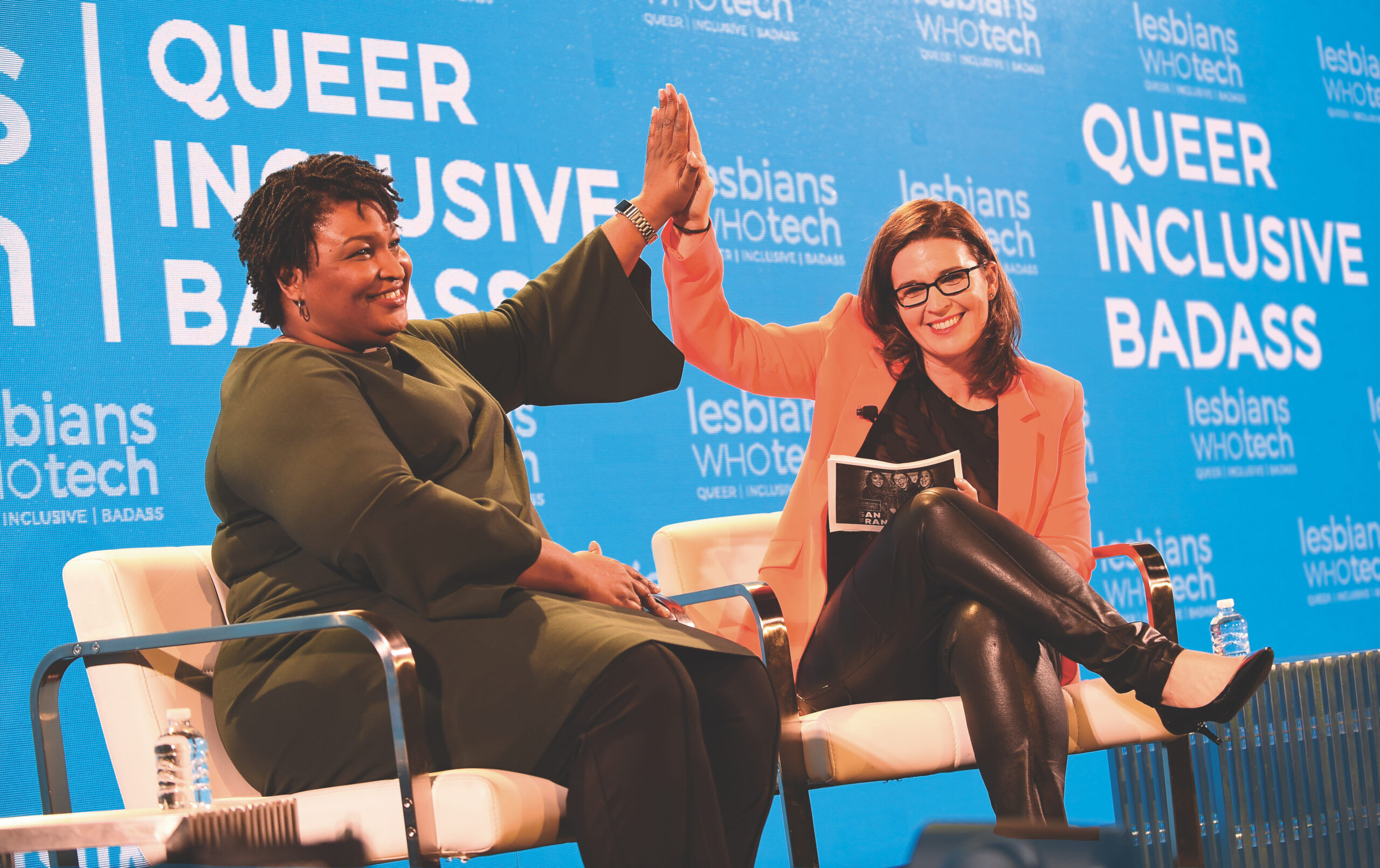 From left, Stacey Abrams and Leanne Pittford at Lesbians Who Tech conference