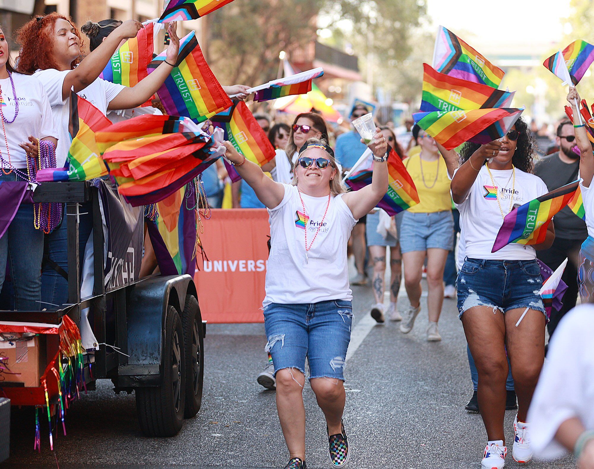 Marchers cheer during the Come Out With Pride Parade