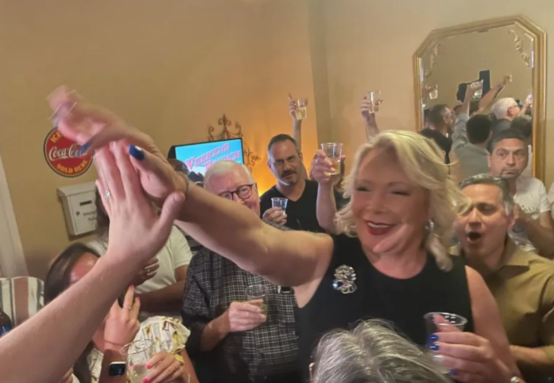 Hill celebrating her victory with supporters on Election Night.