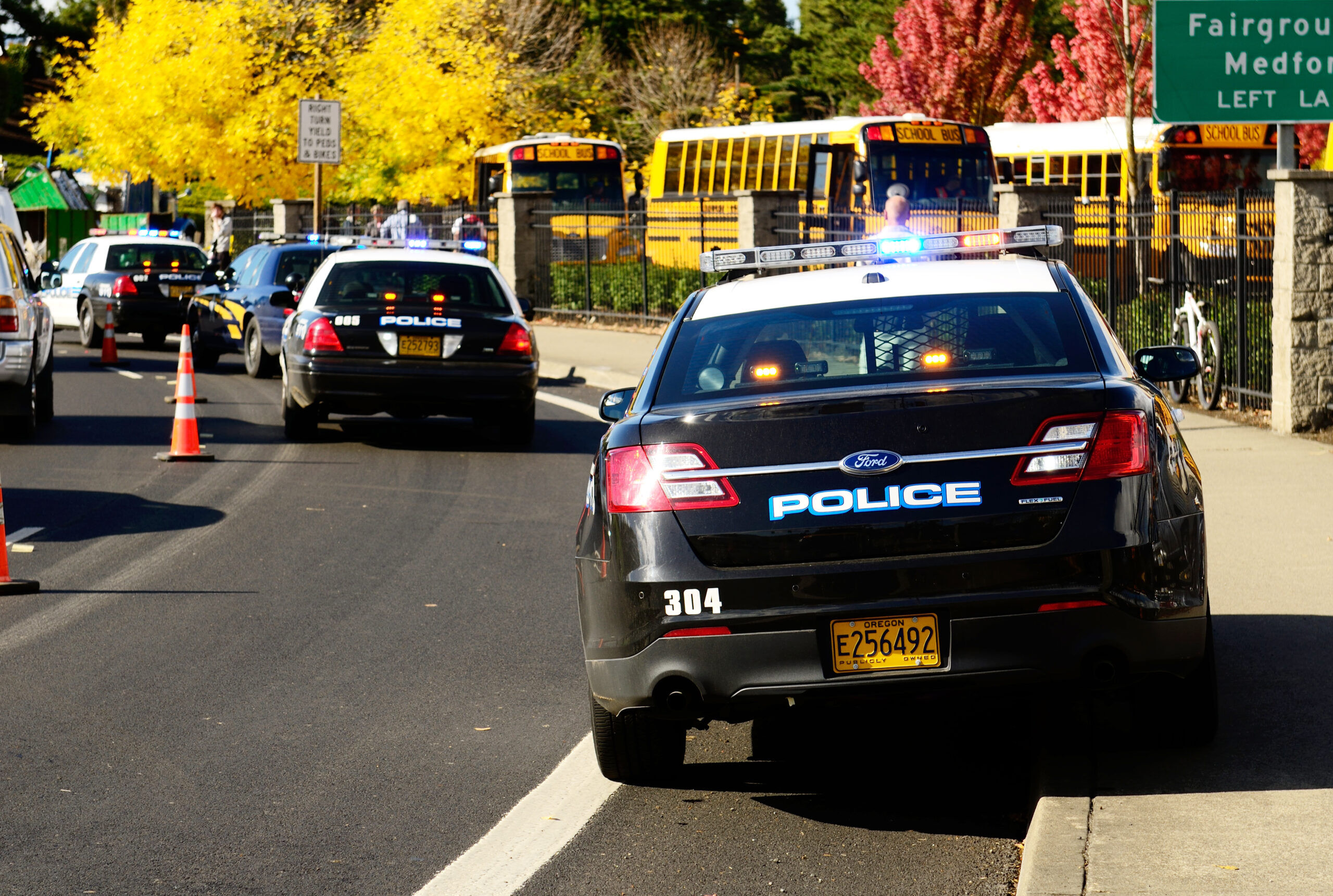 Roseburg,,Or,-,October,16:,Police,Cars,And,School,Buses, school bombing threats