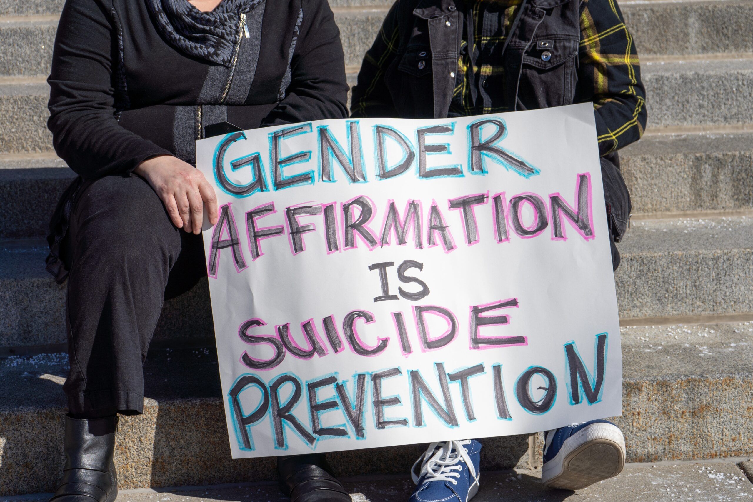 February 24, 2023, Boise, Idaho, protect transgender youth rally. People holding flags and signs in support of transgender youth being able to receive gender, affirming care.