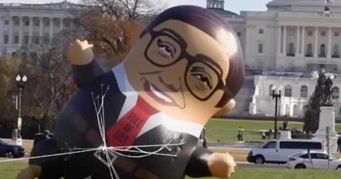 The balloon of shows the freshman representative in glasses with a red shirt that says "Full of Lies"