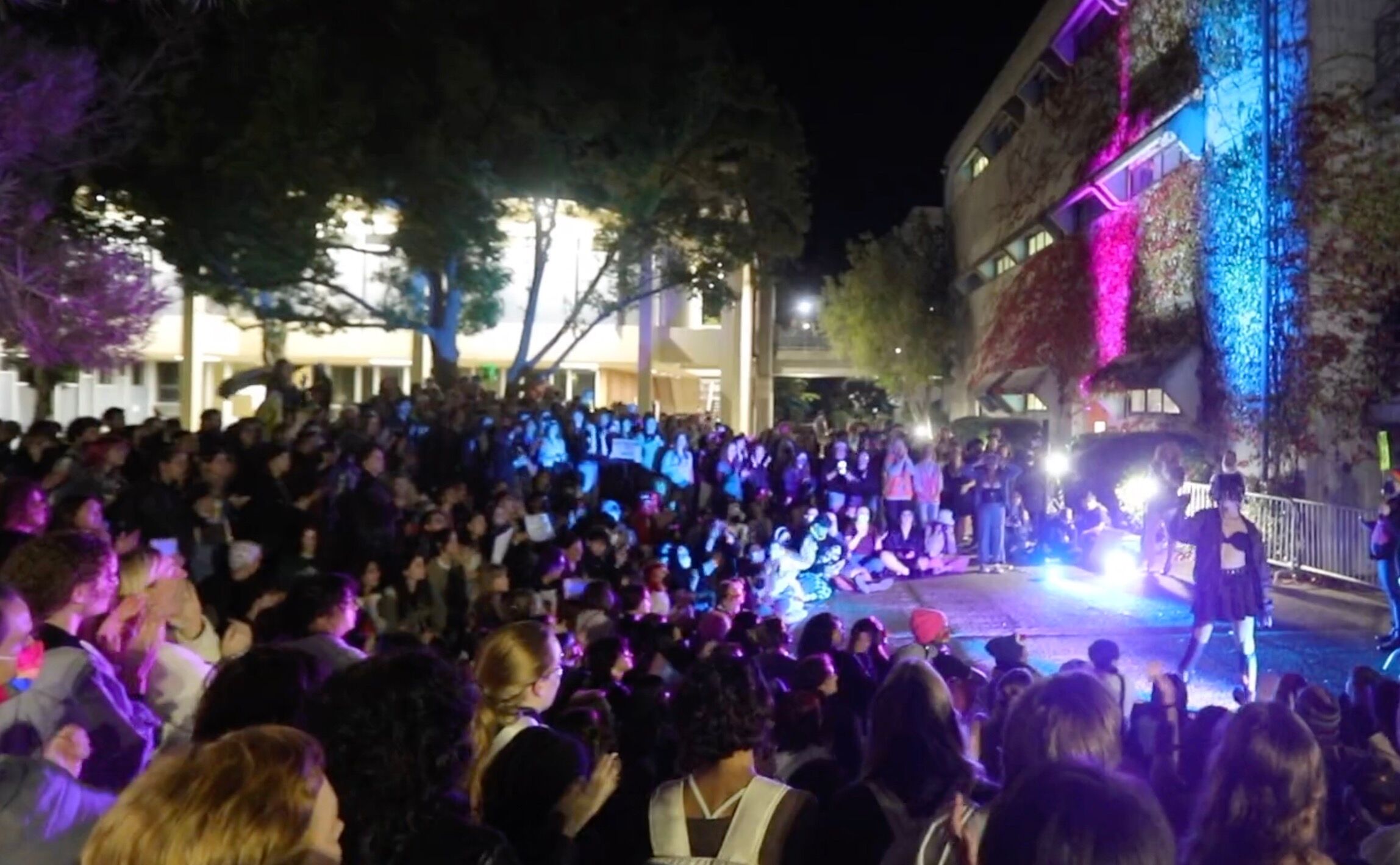 300 students watch a guerilla drag show outside of a venue hosting an anti-trans event