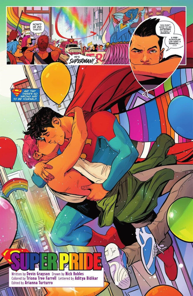 As Robin sulks during a Pride parade, the bisexual caped crusader Superman (Jon Kent) kisses his gay journalist boyfriend Jay Nakamura.