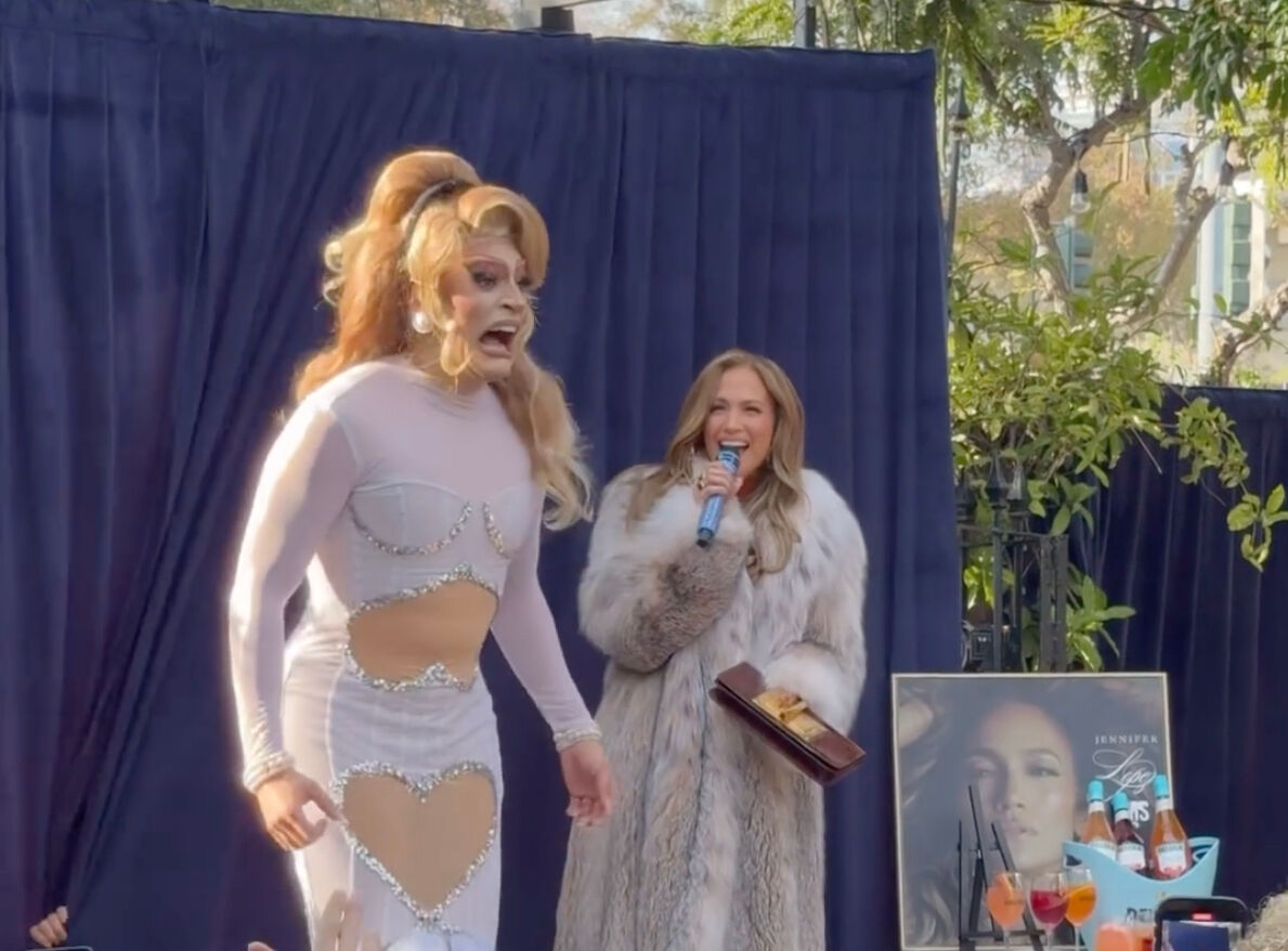Jennifer Lopez (right) on stage at The Abbey with drag performer Jo Lopez.