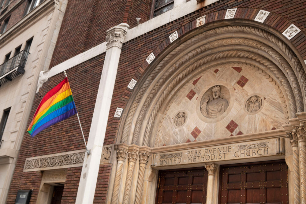 New York, NY, USA-December 28, 2019 A Untied Methodist Church with a Pride Flag showing support for the LGBT community