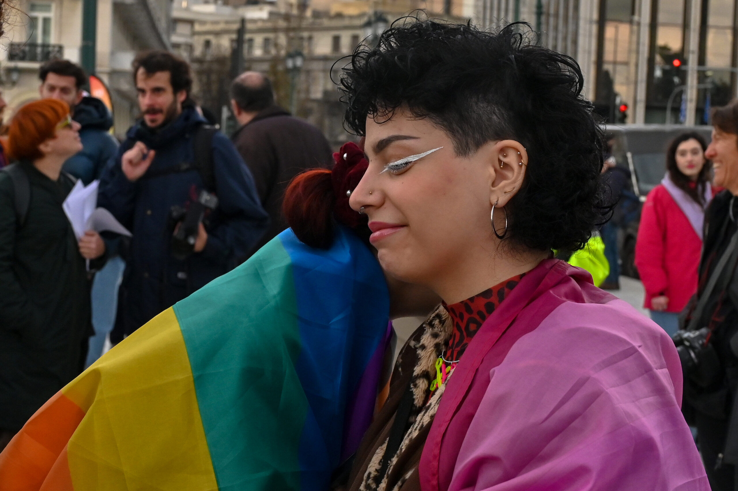 ATHENS, GREECE - FEBRUARY 15: LGBT people react as supporters of the bill which legalises same-sex civil marriage gather in front of the Greek parliament