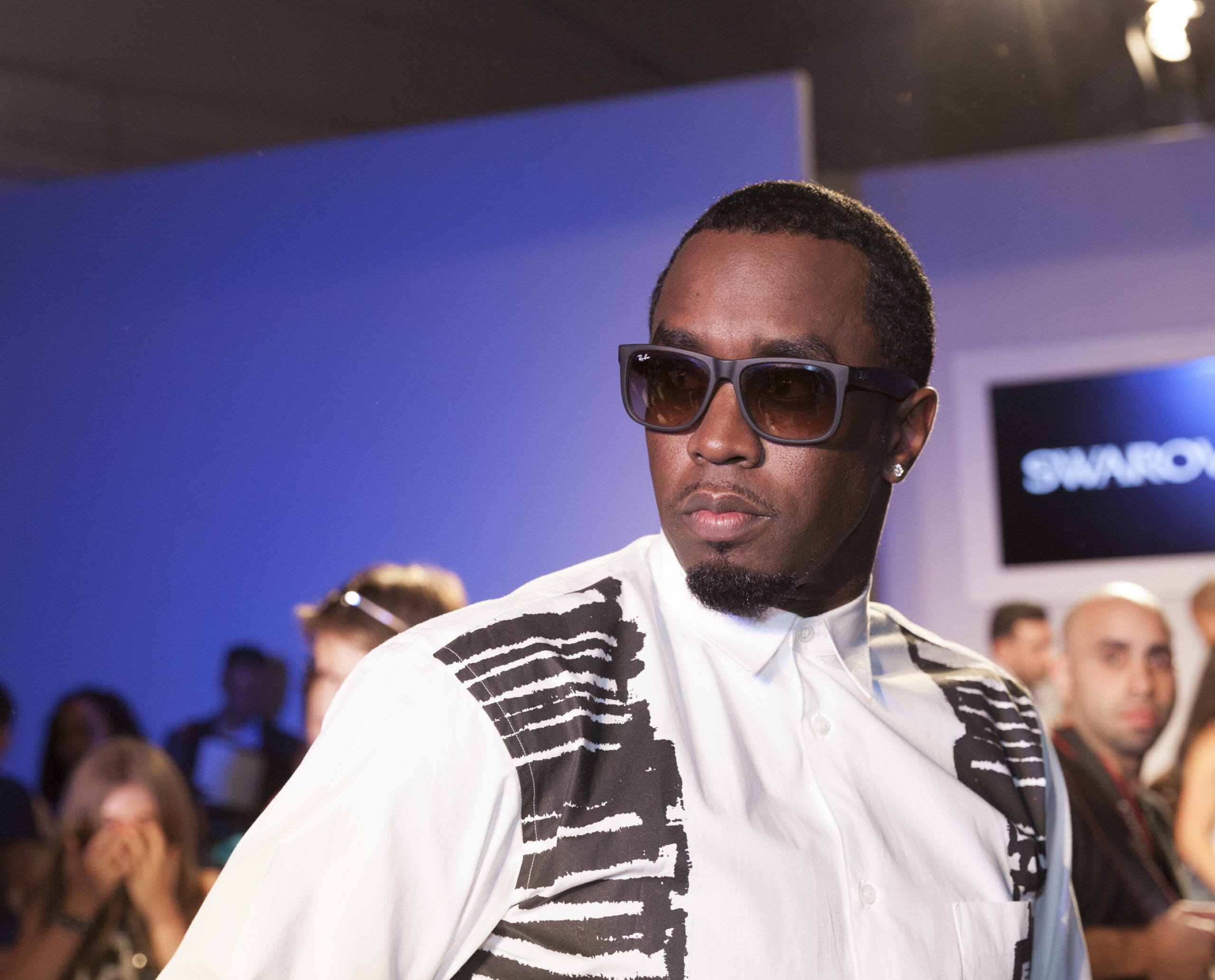 NEW YORK - OCTOBER 5: Sean John Combs P Daddy attends Swarovski show at Vogue Bambini petiteParade Kids Fashion Week at Industrial Superstudio on October 5, 2013 in New York City