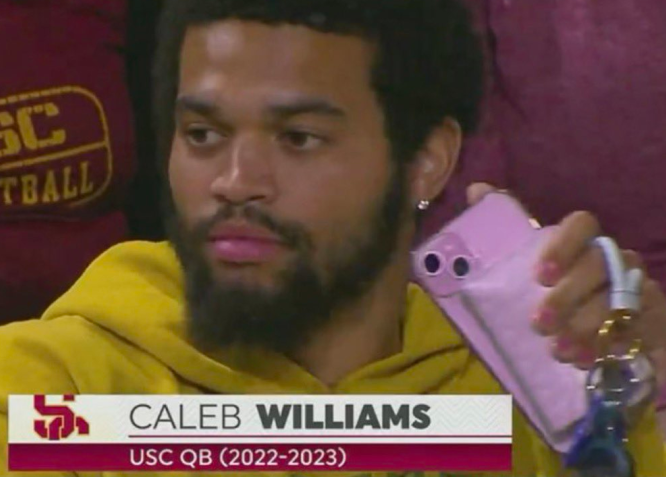 Football star derided as gay for bringing pink accessories to women’s basketball game