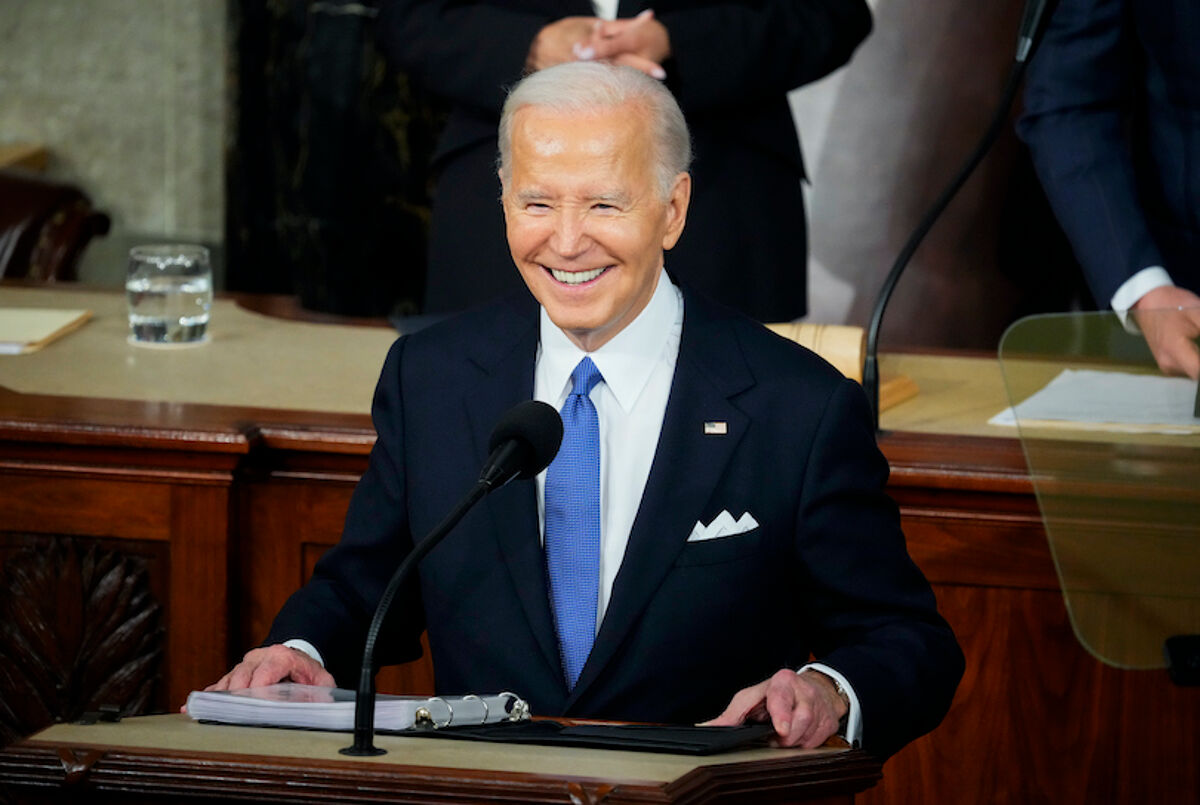 Mar 7, 2024; Washington, DC, USA; President Joe Biden smiles before delivering the State of the Union address to Congress at the U.S. Capitol in Washington March 7, 2024. Left is Vice President Kalama Harris, right is Speaker of the House Mike Johnson (R-La) Mandatory Credit: Josh Morgan-USA TODAY