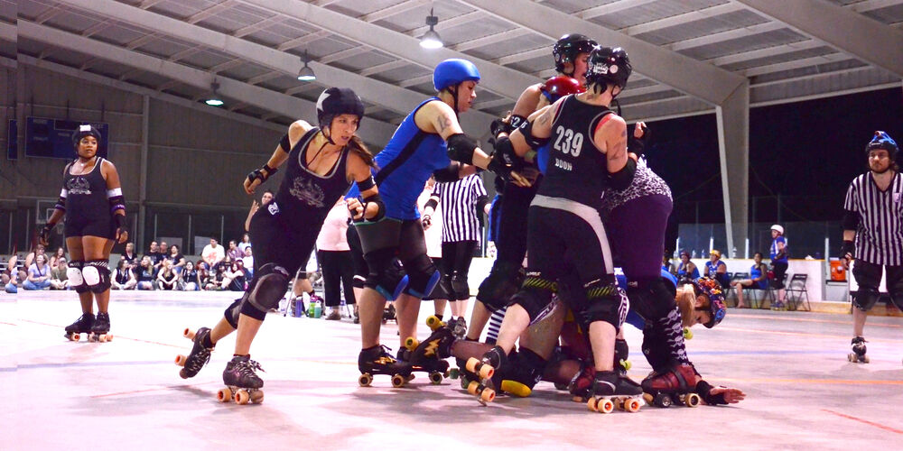 Ann Arbor Brawlstars jammer passes the pack in a roller derby game against the Northern Kentucky Blackouts in Ann Arbor, MI on July 12, 2014.
