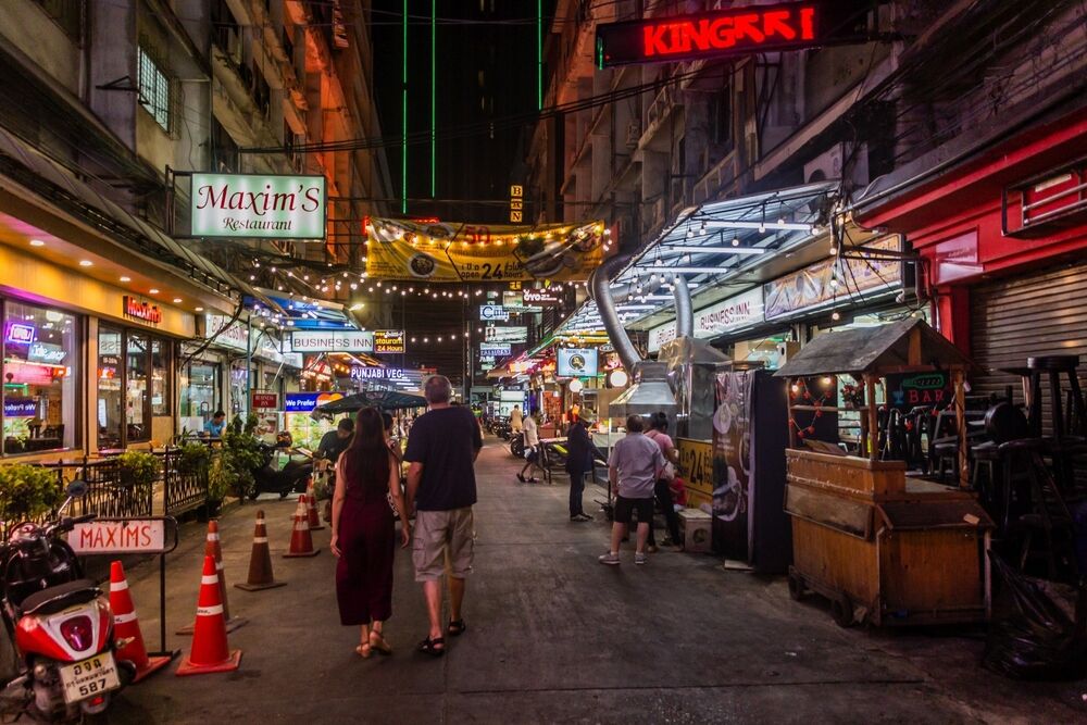 Night view of Sukhumvit Soi 11 alley in Bangkok, Thailand