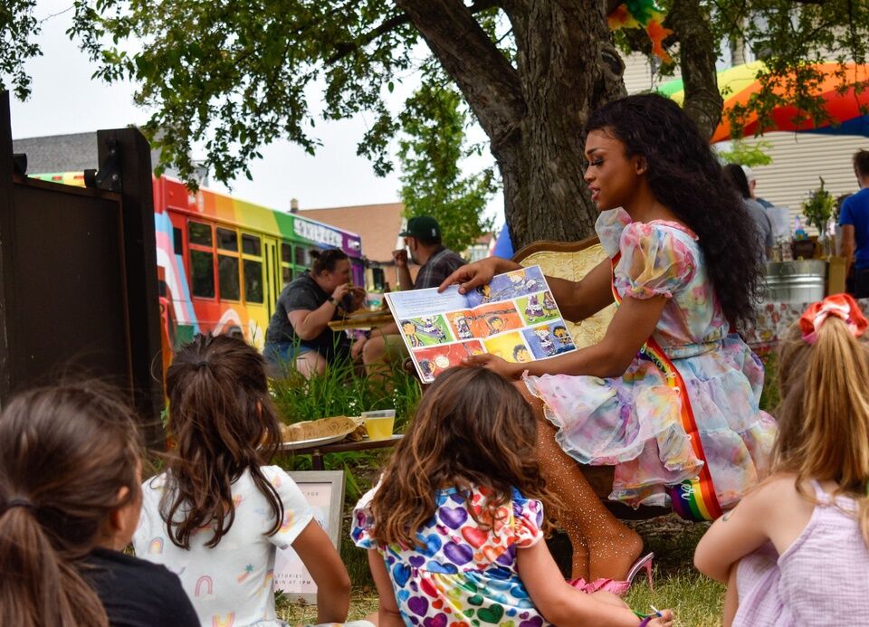 Kids gather for the West Allis Pride event's "Drag Queen Story Hour," to hear Princess Janelza read three children's books.