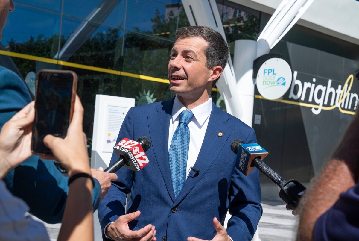 Secretary of Transportation Pete Buttigieg talks to the media during his visit to the Brightline station in West Palm Beach, Florida on October 17, 2023.