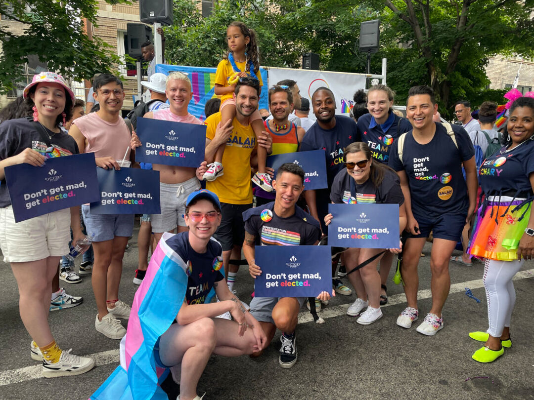 LGBTQ+ Victory Fund volunteers at Pride parade.