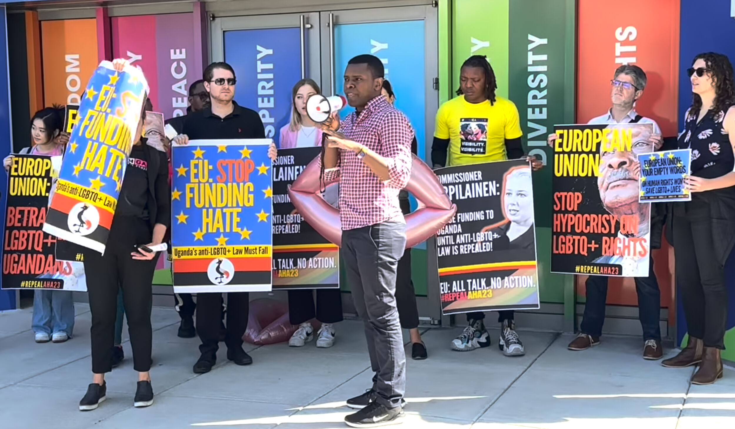 Activist Hillary Innocent Taylor Seguya addresses protesters outside the European Union Delegation to the U.S. in Washington, D.C.
