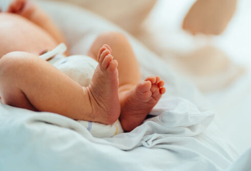 Trans throuple celebrates birth of new baby & shares their joy with the world