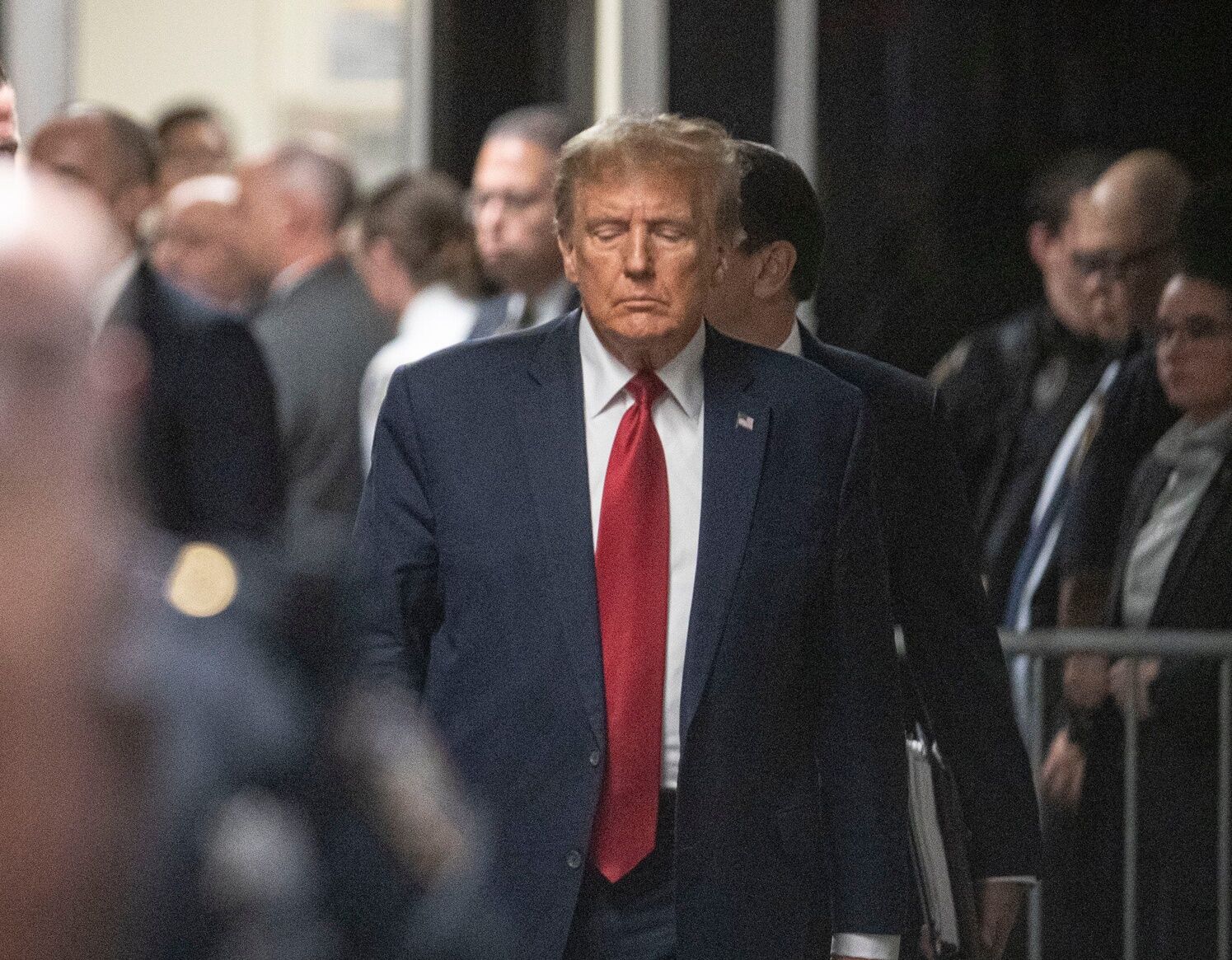 Former President Donald Trump walks from the courtroom at the Manhattan Criminal Courthouse on Feb. 15, 2024