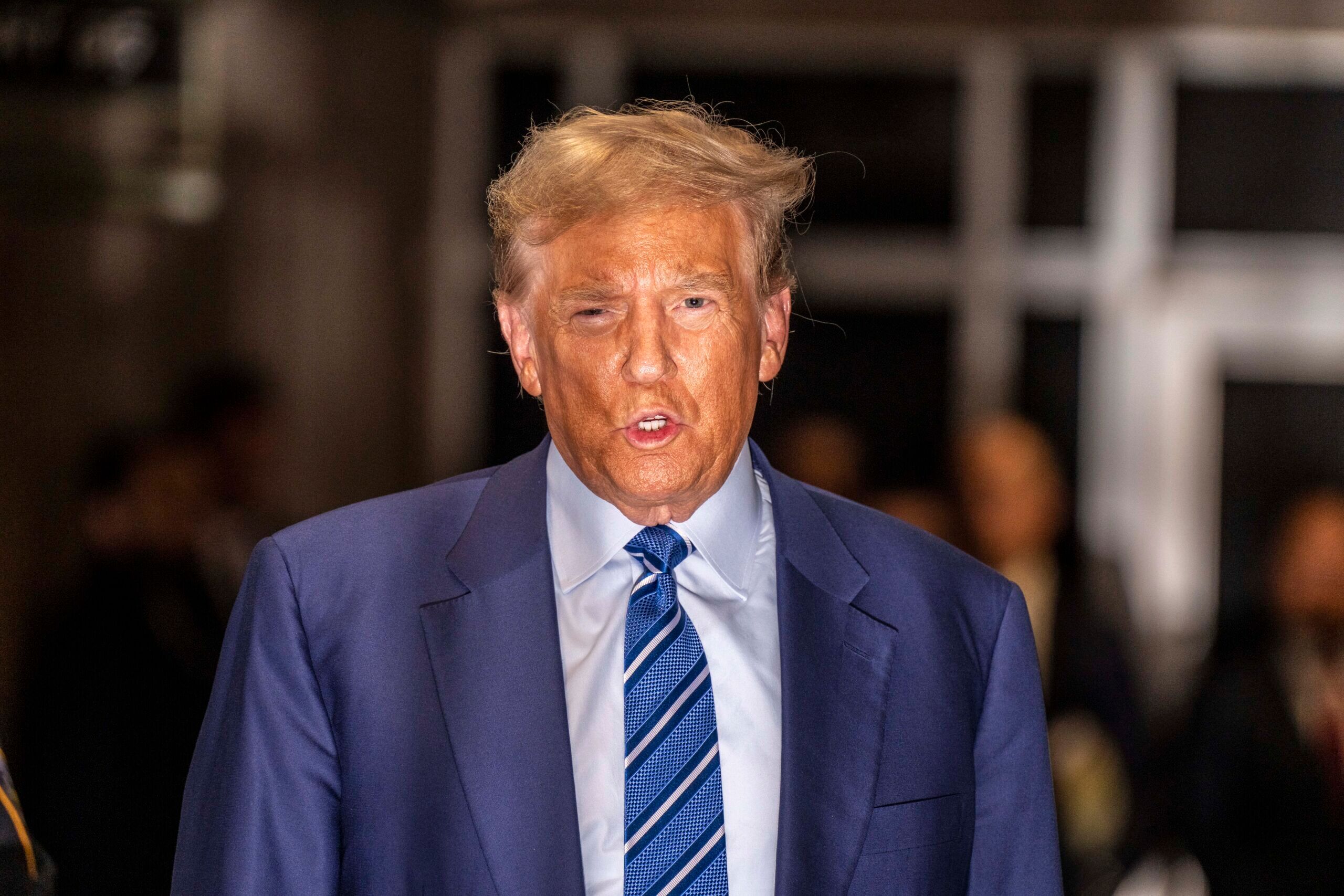 Apr 16, 2024; New York, NY, USA; Former U.S. Former President Donald Trump talks as he leaves court in New York City April 16 2024 , where he is facing felony charges related to a 2016 hush money payment to adult film actress Stormy Daniels. It marks the first time in history that a former U.S. president has been tried on criminal charges. Mandatory Credit: Mark Peterson/Pool via USA TODAY NETWORK