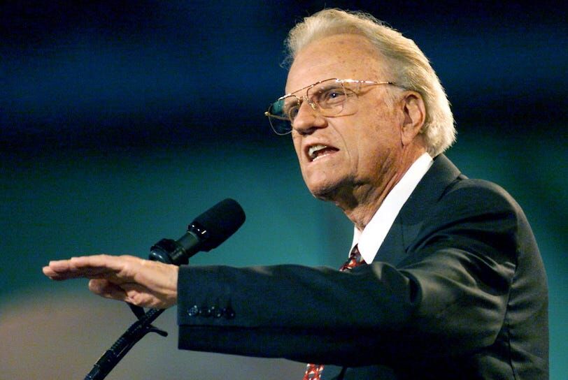 The Rev. Billy Graham preaches to the crowd of 45,000 during the Billy Graham Crusade at the Adelphia Coliseum June 1, 2000. Billy Graham