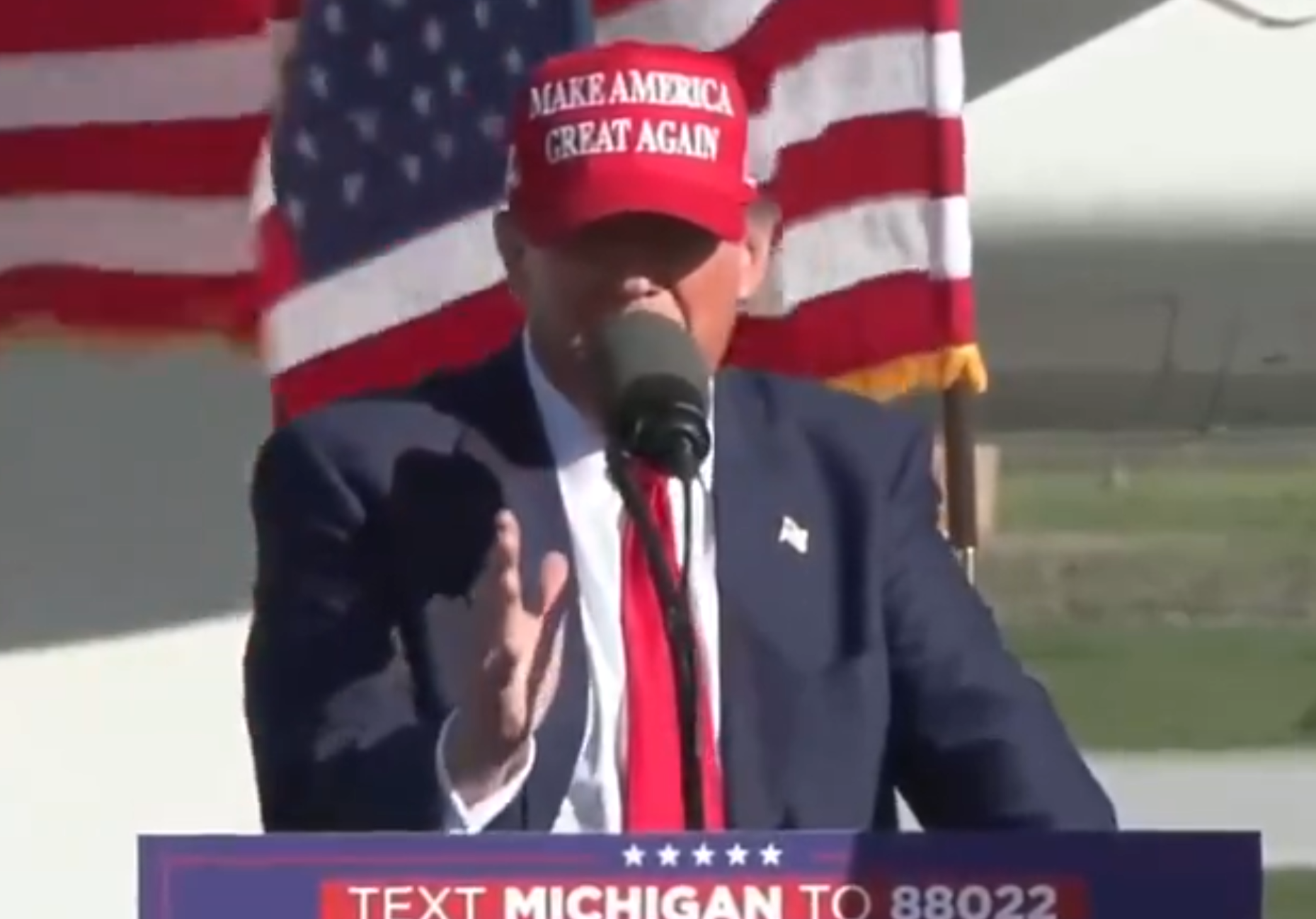 Donald Trump speaking at a rally in Freeland, Michigan