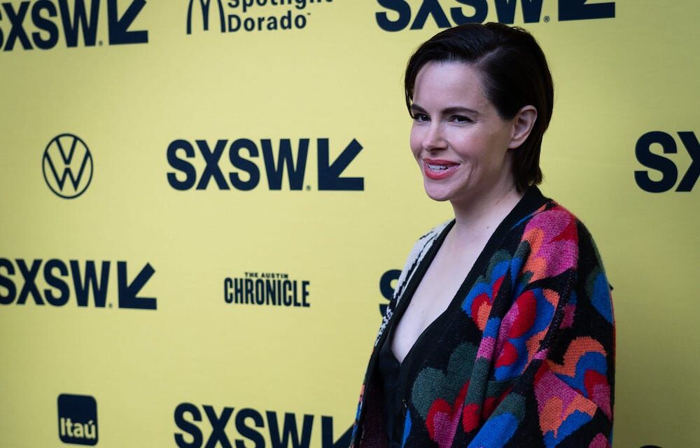 Emily Hampshire, who plays character "Mary" in the film "Self Reliance" walks the red carpet at the SXSW world premiere of the film, held at the Paramount Theatre in Austin, March 11, 2023.

Sxsw South By Southwest Day 2 Self Relience Red Carpet Sed 10