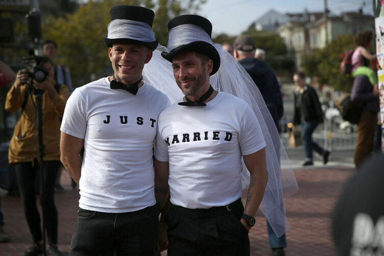 SAN FRANCISCO, CA - JUNE 26: Same-sex marriage supporters wear just married shirts while celebrating the U.S Supreme Court ruling regarding same-sex marriage on June 26, 2015 in San Francisco, California. The high court ruled that same-sex couples have the right to marry in all 50 states. (Photo by Justin Sullivan/Getty Images)
