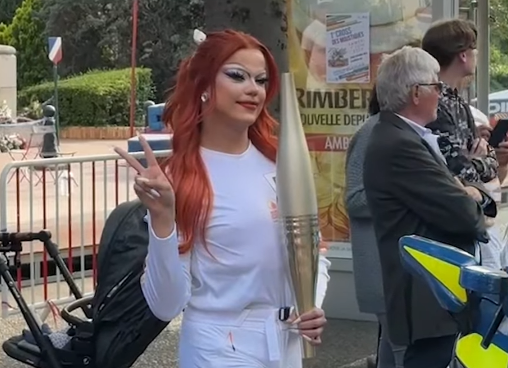 Nicky Doll holding the torch that had the flame