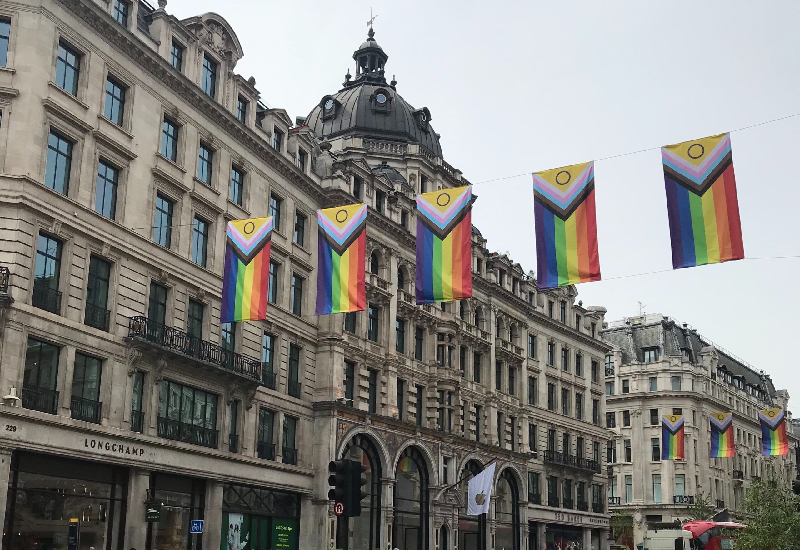 Intersex-inclusive Progress Pride flags flying over London's Regent Street.