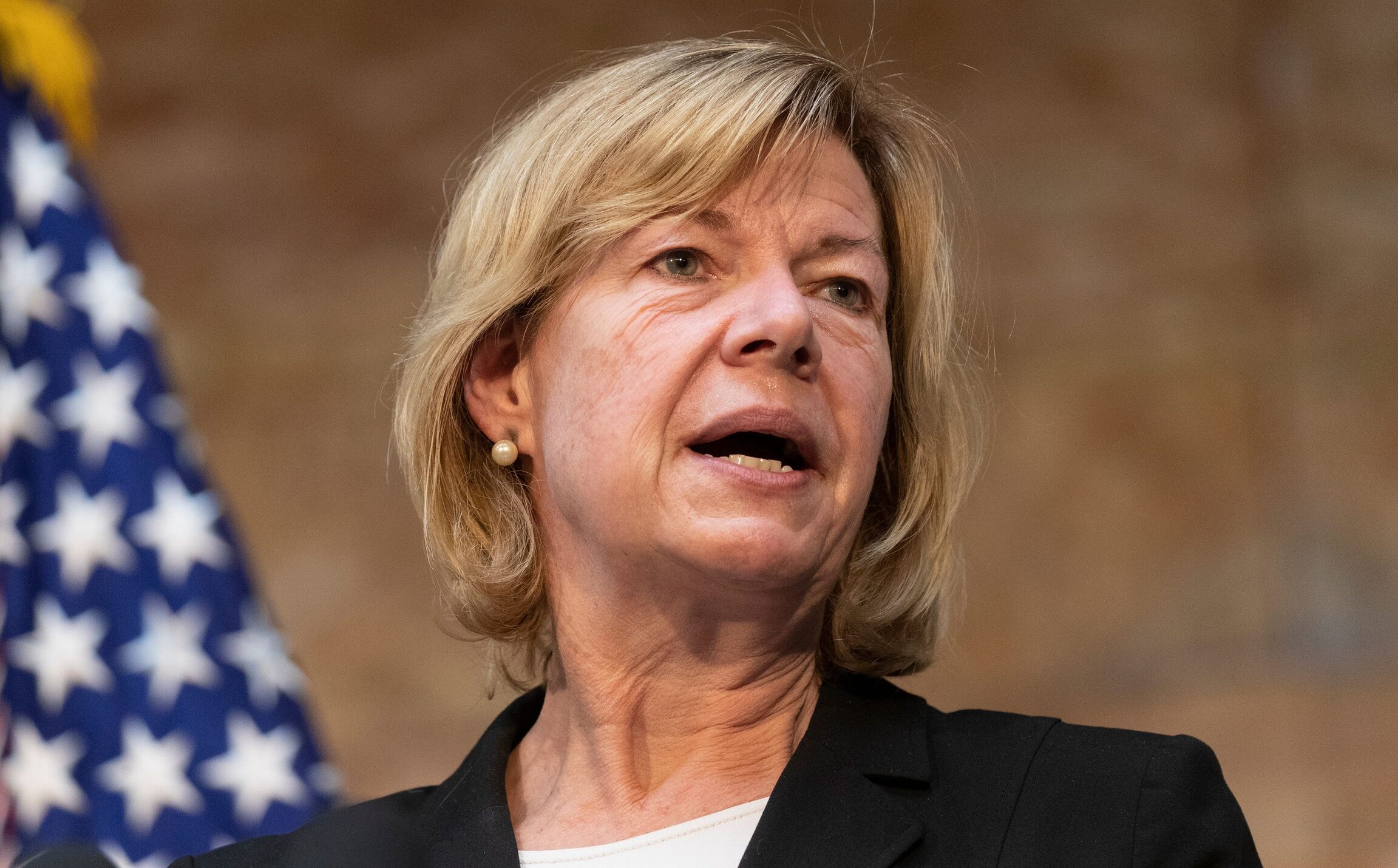 Sen,. Tammy Baldwin (D-WI) speaks before Vice President Kamala Harris Monday, January 24, 2022