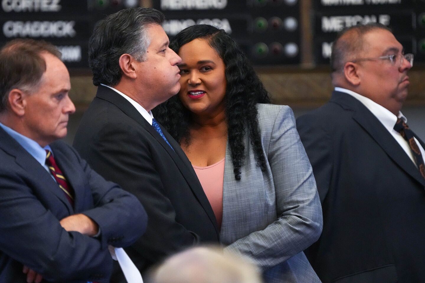 Texas Rep. Shawn Thierry, right, speaks to Rep. Raymond Peña ahead of a reading of Senate Bill 2 in the House Chamber at the Texas Capitol on Thursday, July 13, 2023.