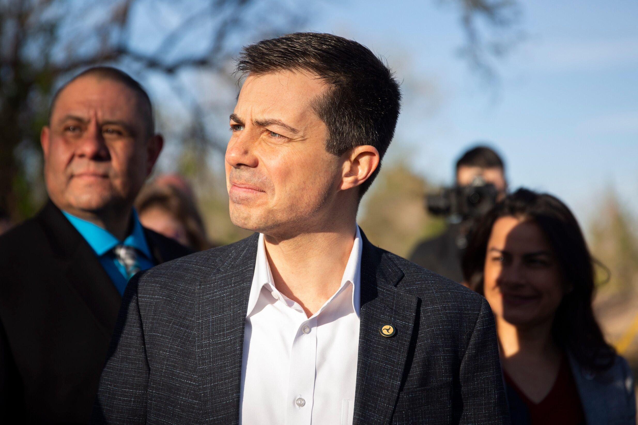 Secretary of Transportation Pete Buttigieg walks with local representatives while discussing the $10 million grant for Las Cruces