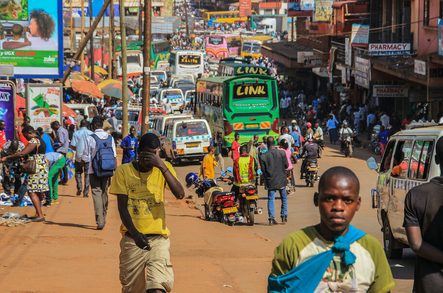 Kampala, Uganda - January 28, 2018: The street life of Uganda's capital. Crowd of people on the streets and heavy traffic