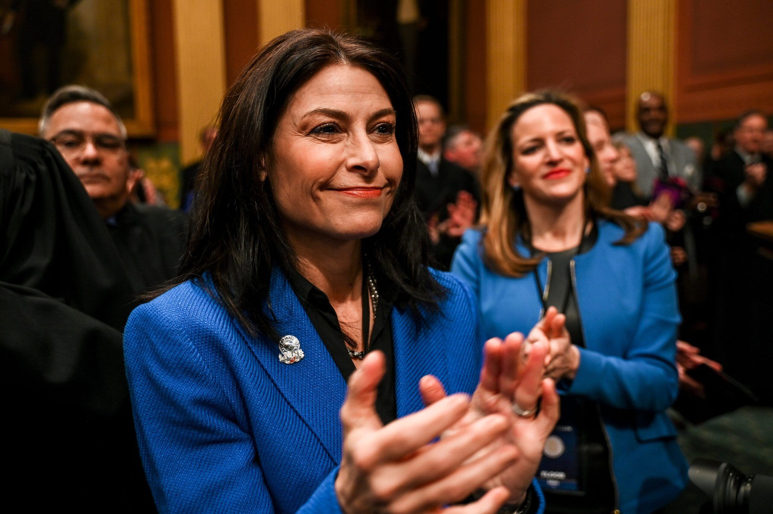 Michigan Attorney General Dana Nessel claps during Gov. Gretchen Whitmer's State of the State address on Wednesday, Jan. 24, 2024, at the Michigan State Capitol in Lansing.